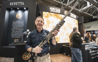 Visitors crowded around the Beretta 500th anniversary stand at the Great British Shooting Show
