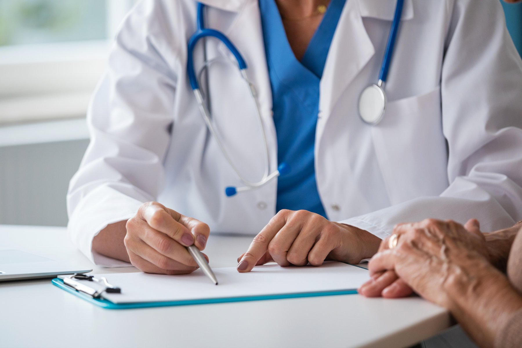 GP consulting room illustrating firearms medical markers on patient records